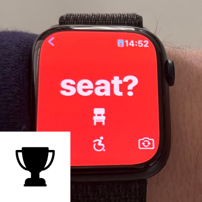 a watch, displaying a red interface with the word seat? on it.